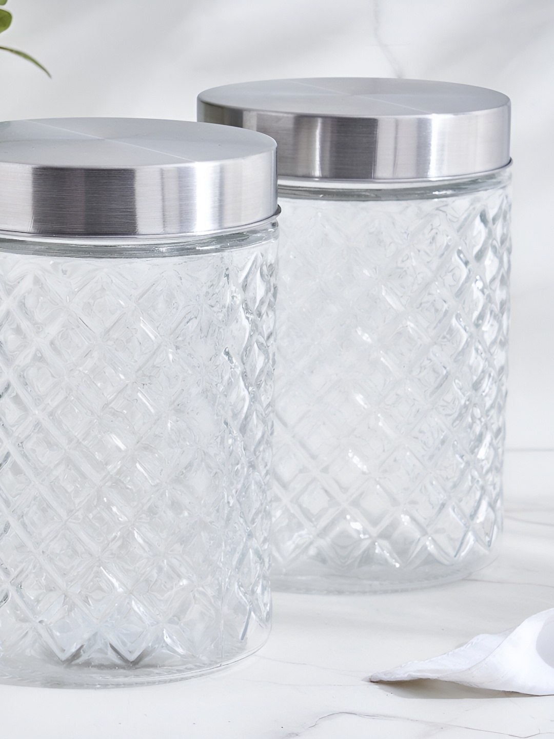 

Home Centre Louvre Arcade Transparent Textured Glass Storage Jar 1L