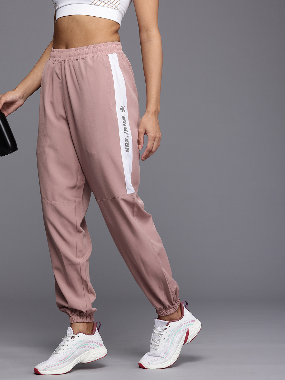 

HRX by Hrithik Roshan Women Printed Rapid Dry & Antimicrobial Finish Running Joggers, Mauve