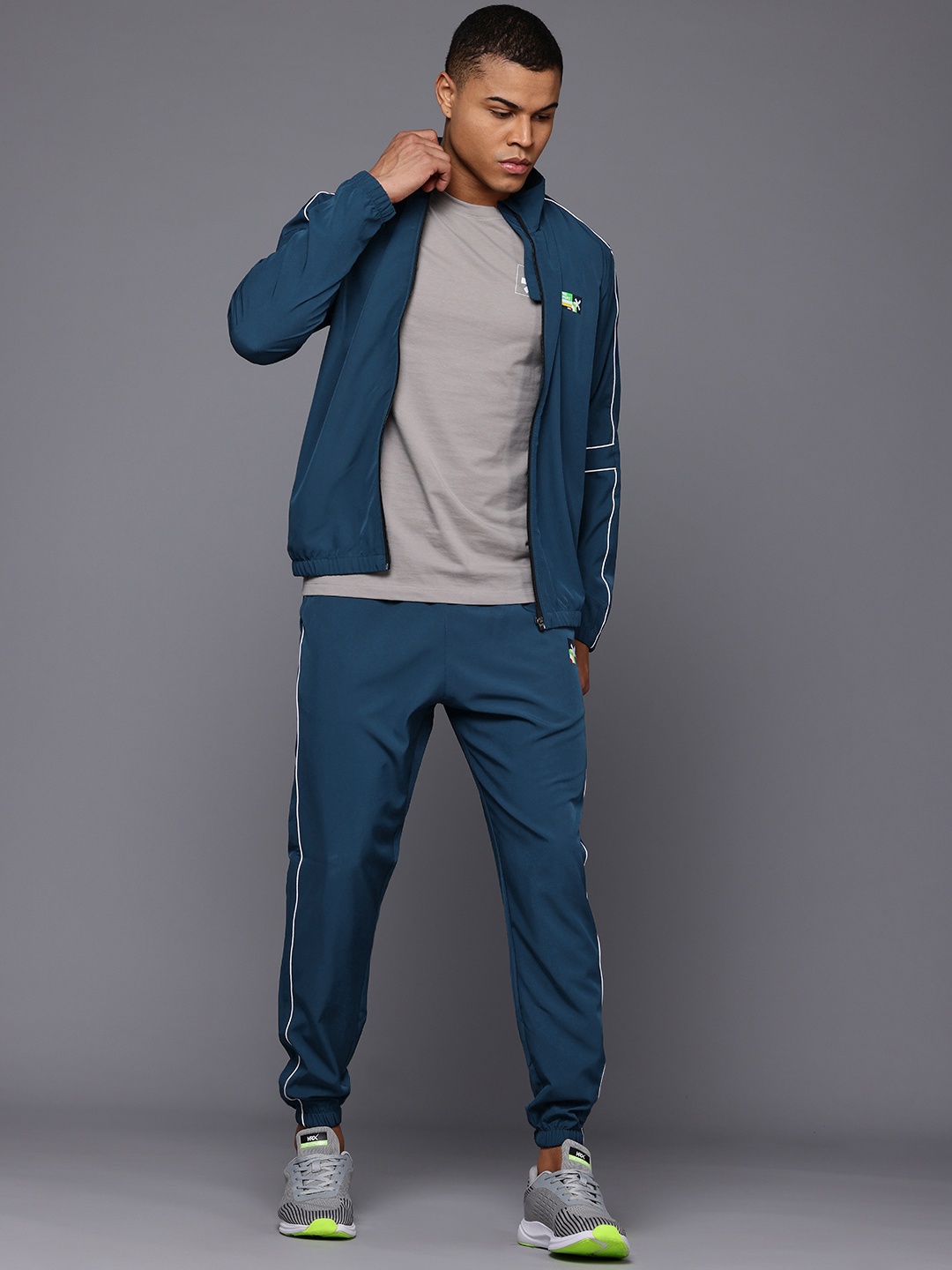 

HRX by Hrithik Roshan Men Regular Fit Tracksuit, Teal