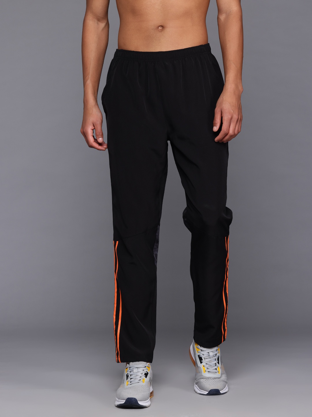 

HRX by Hrithik Roshan Men Side Stripe Detail Rapid-Dry Training Track Pants, Black