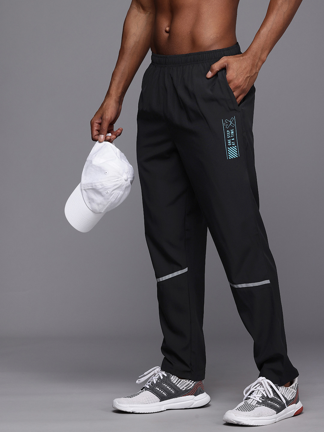 

HRX by Hrithik Roshan Men Rapid-Dry Antimicrobial Running Track Pants, Black