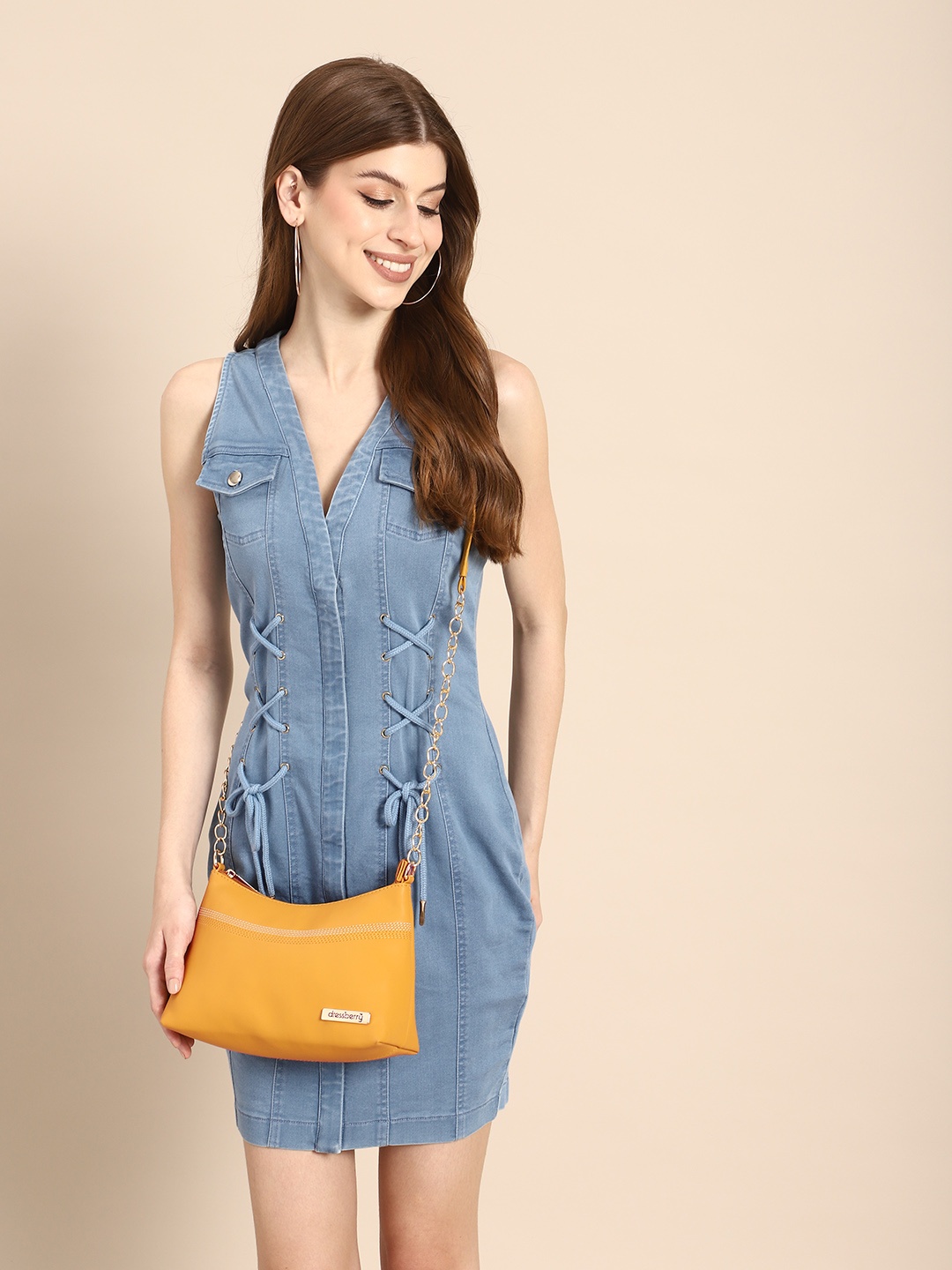 

DressBerry Solid Structured Sling Bag, Yellow