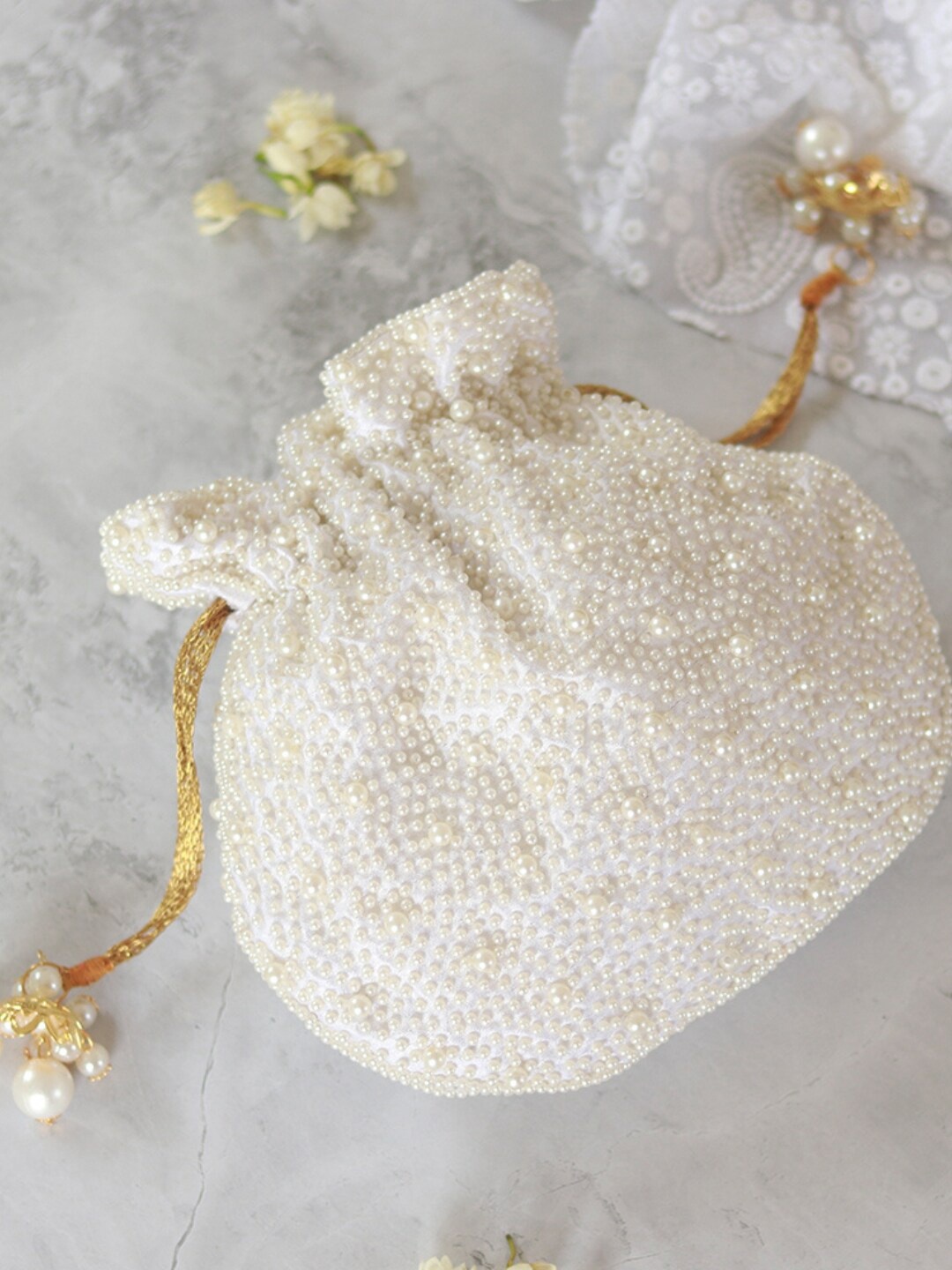 

THE TAN CLAN Nayaab Embroidered Potli Clutch, White