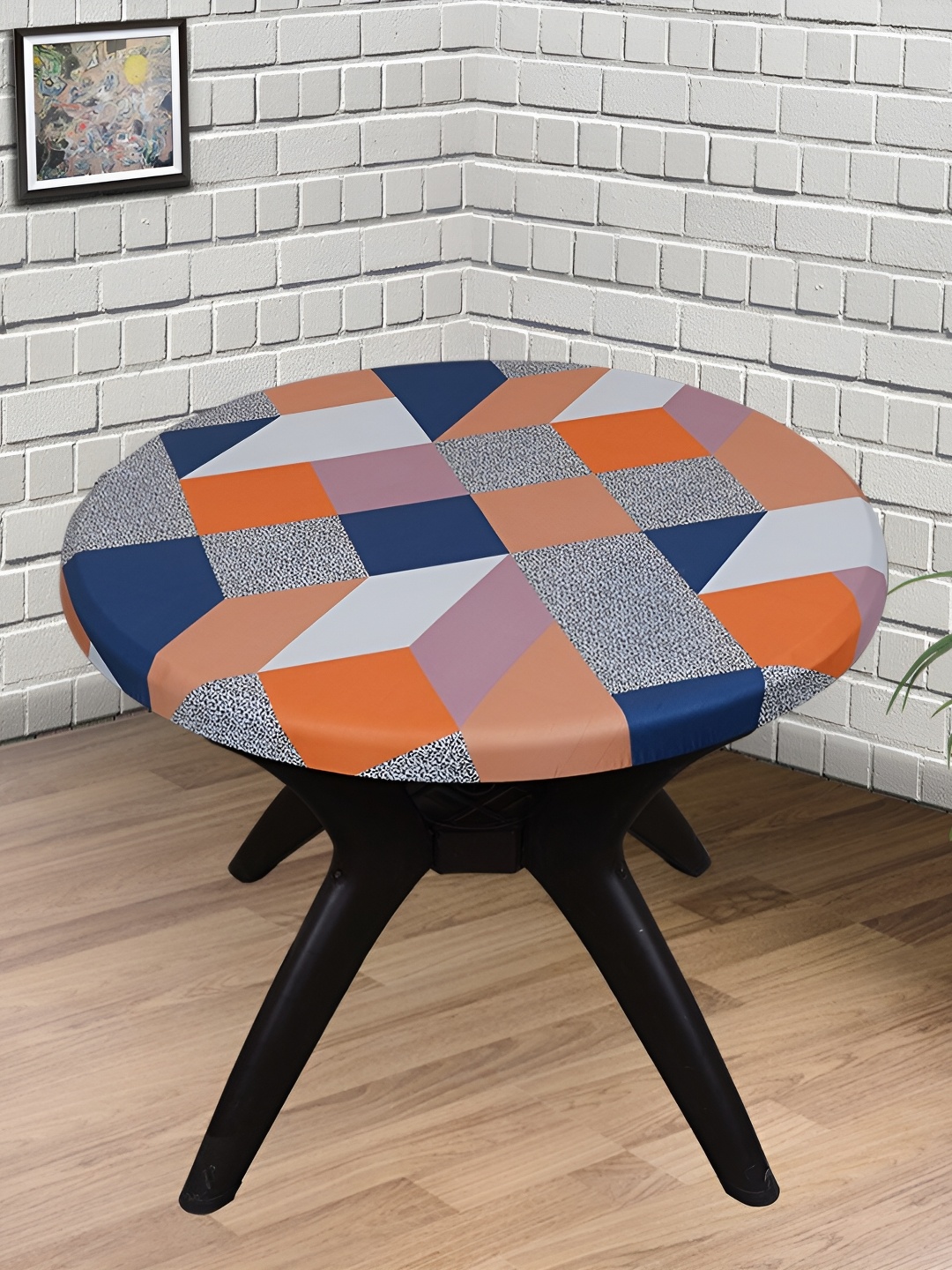

Eleganta Orange Geometric Printed Anti-Slip Round 6-Seater Table Cover