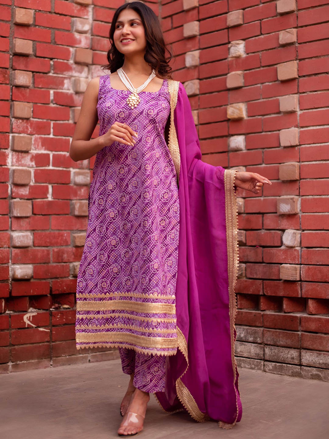 

Calmna Bandhani Printed Straight Kurta With Trousers & Dupatta, Purple