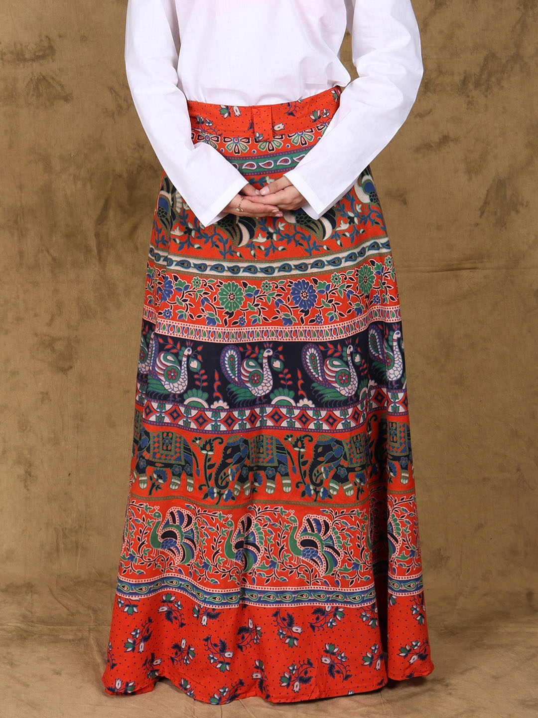 

Exotic India Paisleys & Elephants Printed Cotton Wrap-On Pilkhuwa Long-Skirt, Orange