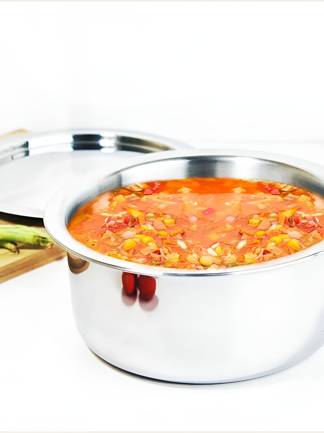 

The Indus Valley Silver Toned Stainless Steel Induction Base Tope With Lid