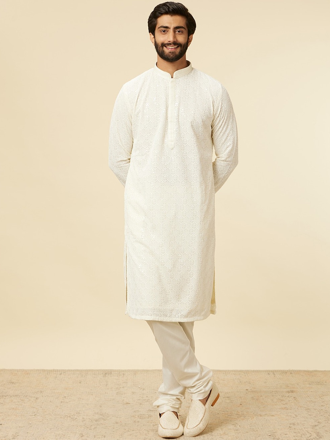 

Manyavar Ethnic Motifs Embroidered Sequinned Kurta with Churidar, Cream