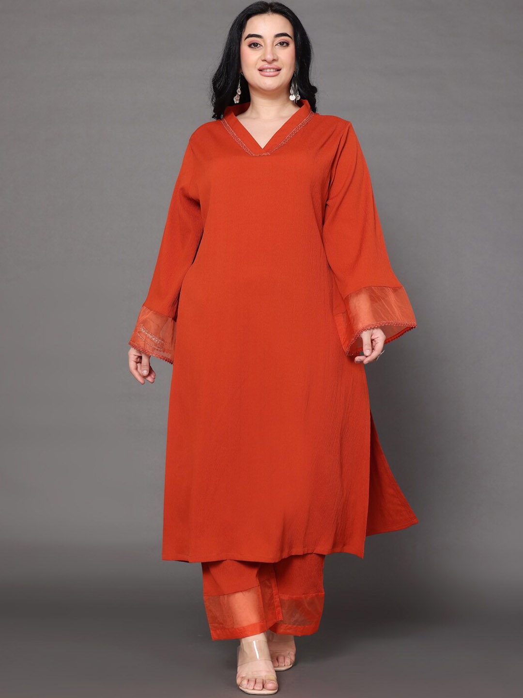 

Varanga Xtra Rust Flared Sleeve Organza detailed Solid Kurta & Palazzo