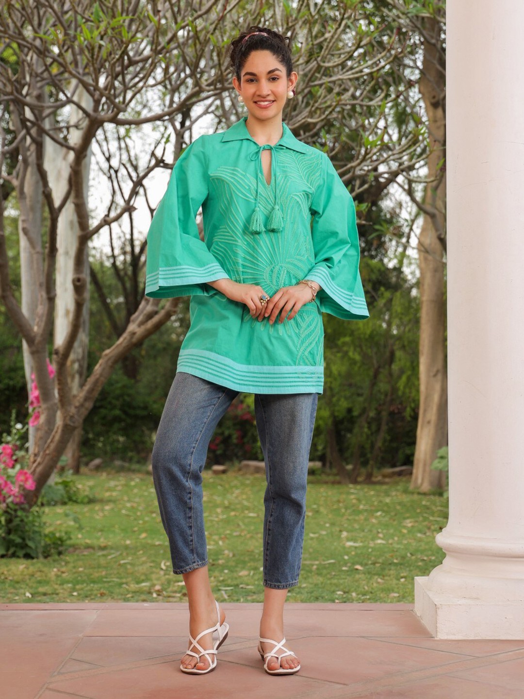 

Nyaro Abstract Embroidered Tie-Up Neck Bell Sleeves Cotton Top, Sea green