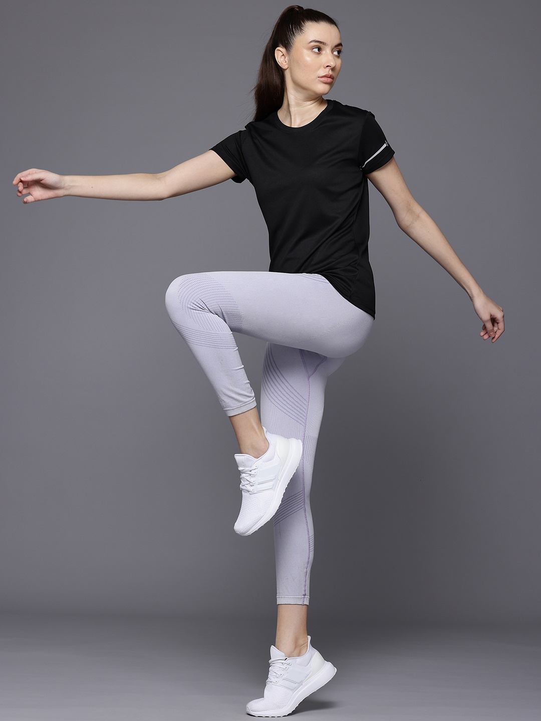 

HRX by Hrithik Roshan Women Solid T-shirt, Black