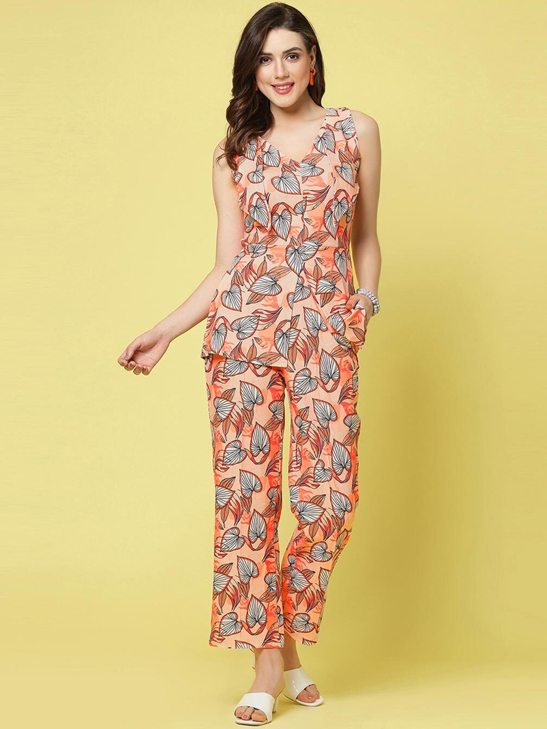 

Divyadham Textiles Tropical Printed V-Neck Sleeveless Top With Trousers, Peach