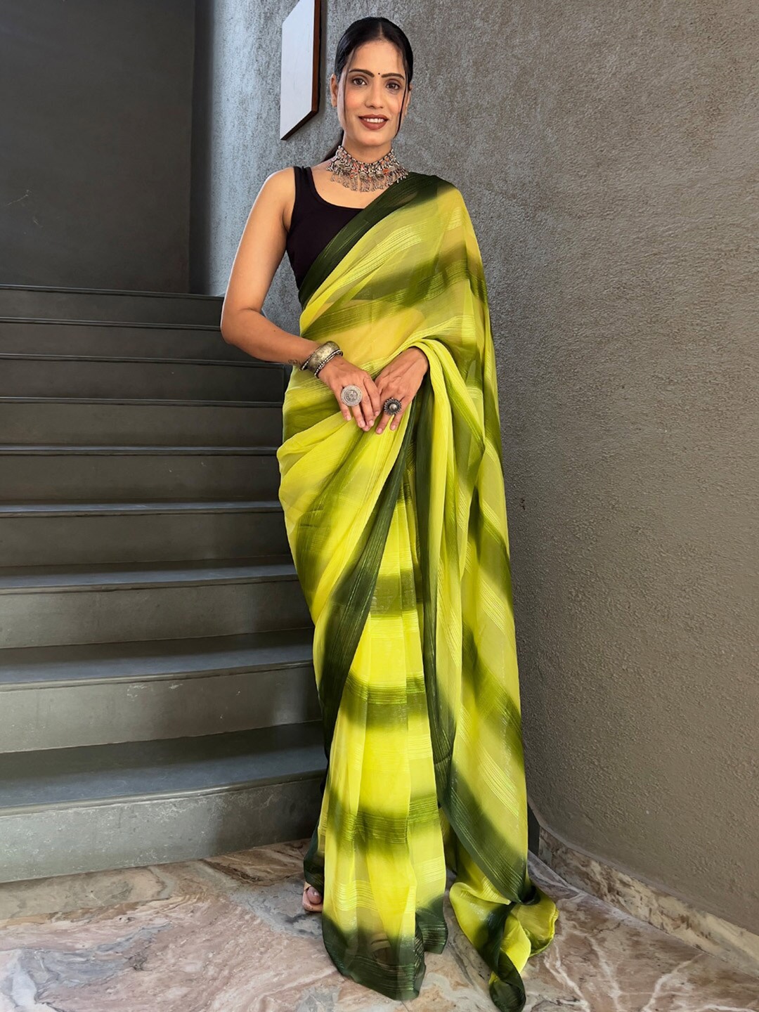 

KALINI Striped Pure Georgette Party Wear Saree, Yellow