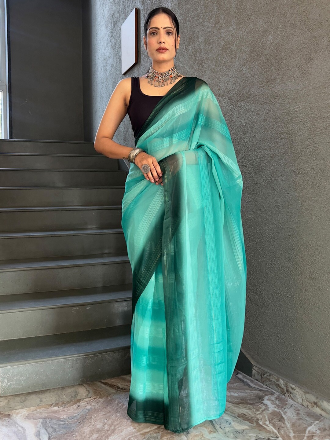 

KALINI Striped Pure Georgette Saree, Turquoise blue