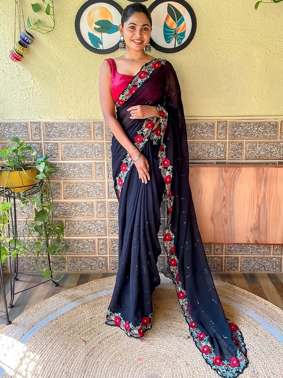 

Mitera Black Embellished Sequinned Poly Georgette Saree