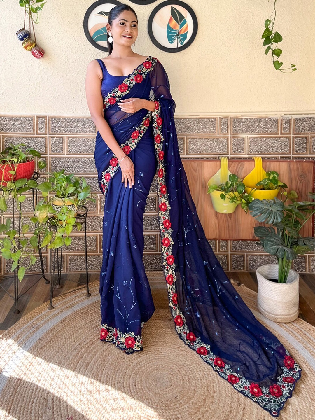 

Mitera Navy Blue Floral Embroidered Poly Georgette Saree