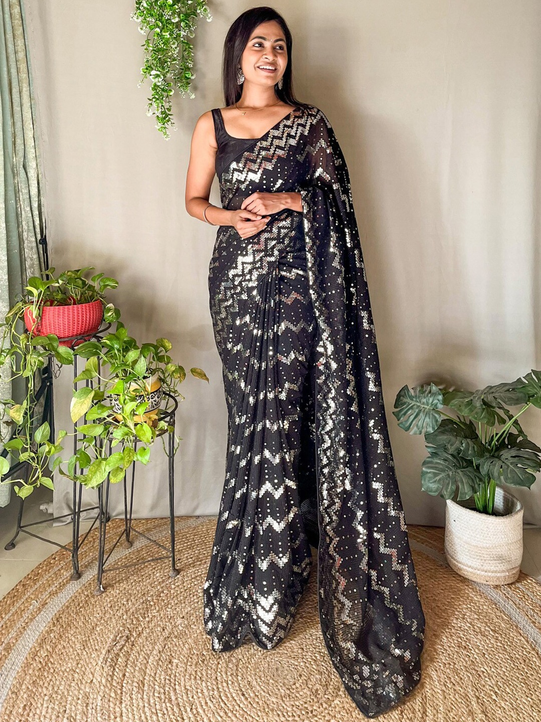 

Mitera Black Embellished Sequinned Pure Georgette Saree