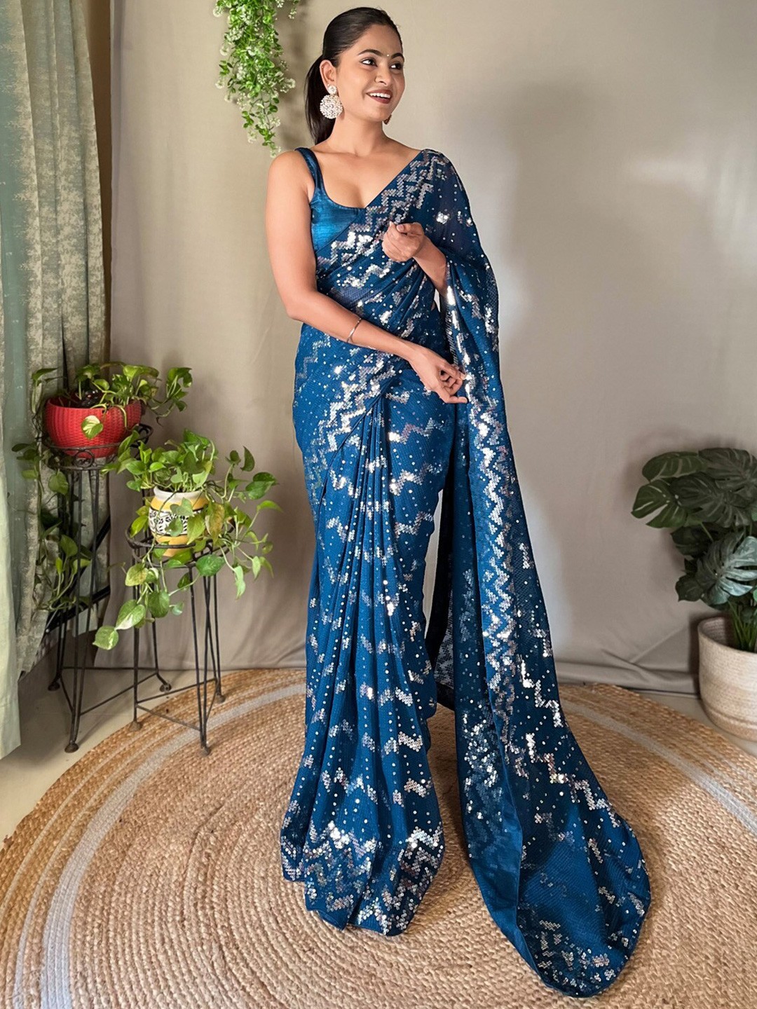 

Mitera Teal Blue Embellished Sequinned Pure Georgette Saree