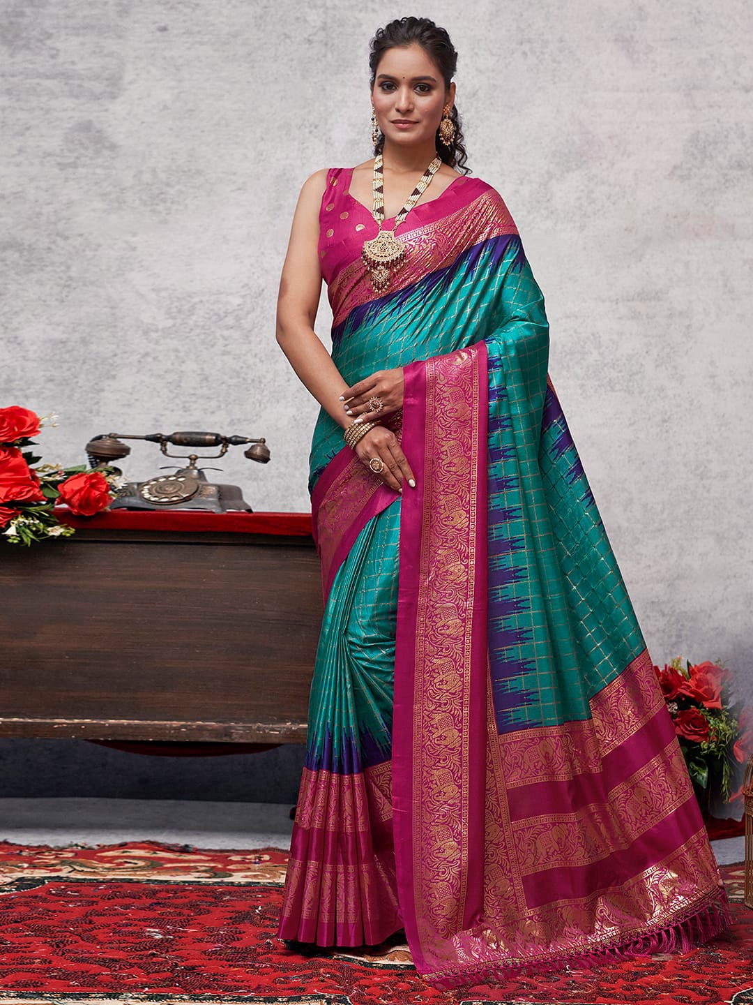 

Mitera Teal Blue Checked Zari Narayan Peth Saree