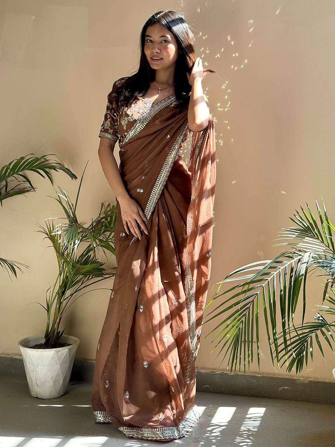 

Mitera Brown Floral Embroidered Sequinned Organza Saree