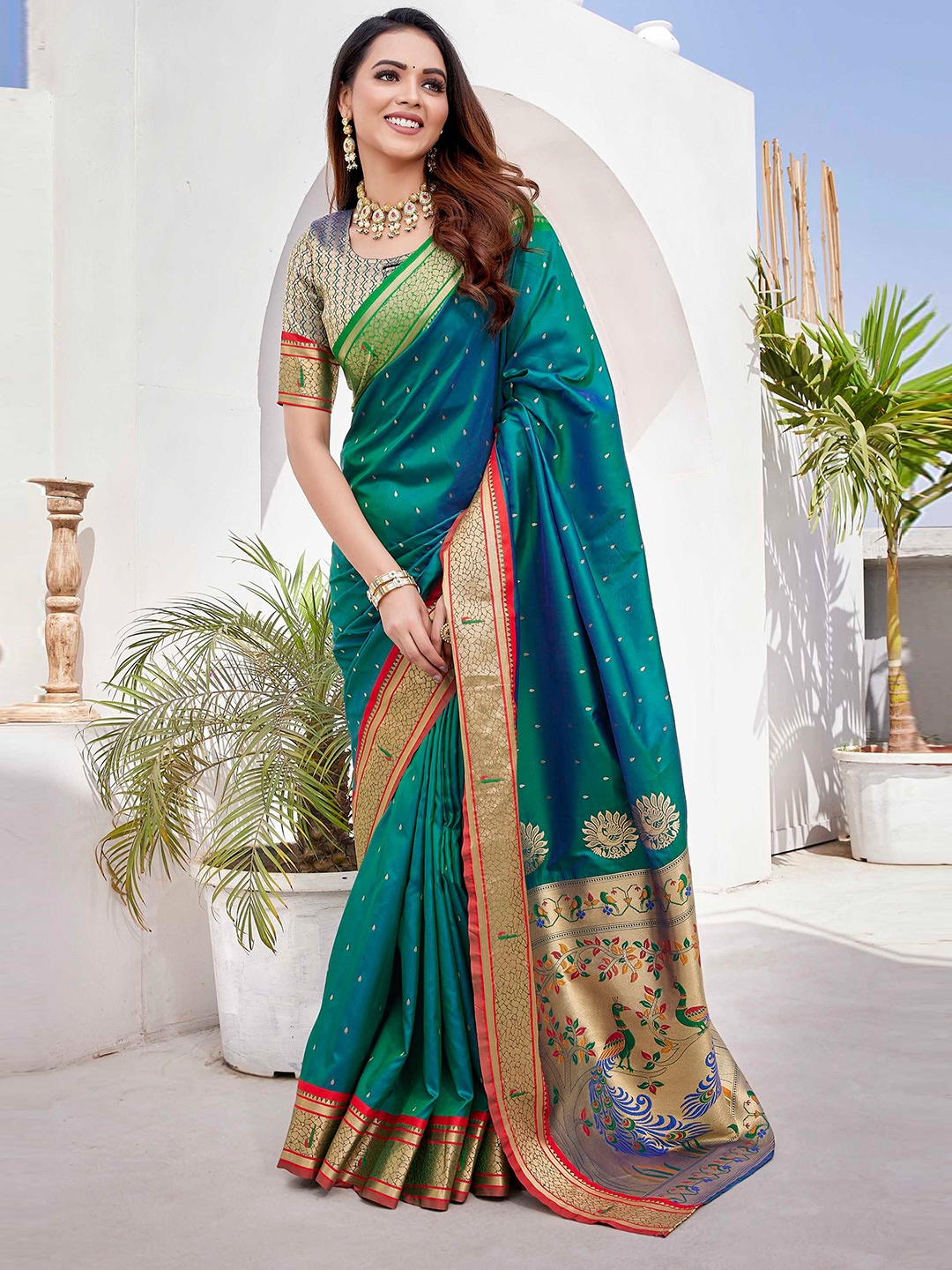 

Mitera Teal Green Woven Design Zari Paithani Saree