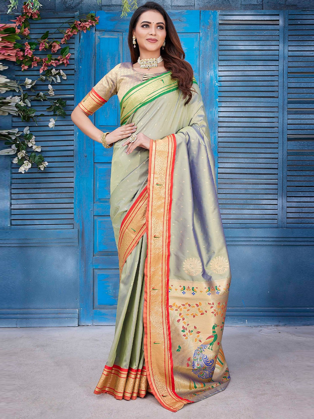 

Mitera Green Floral Woven Design Zari Paithani Saree