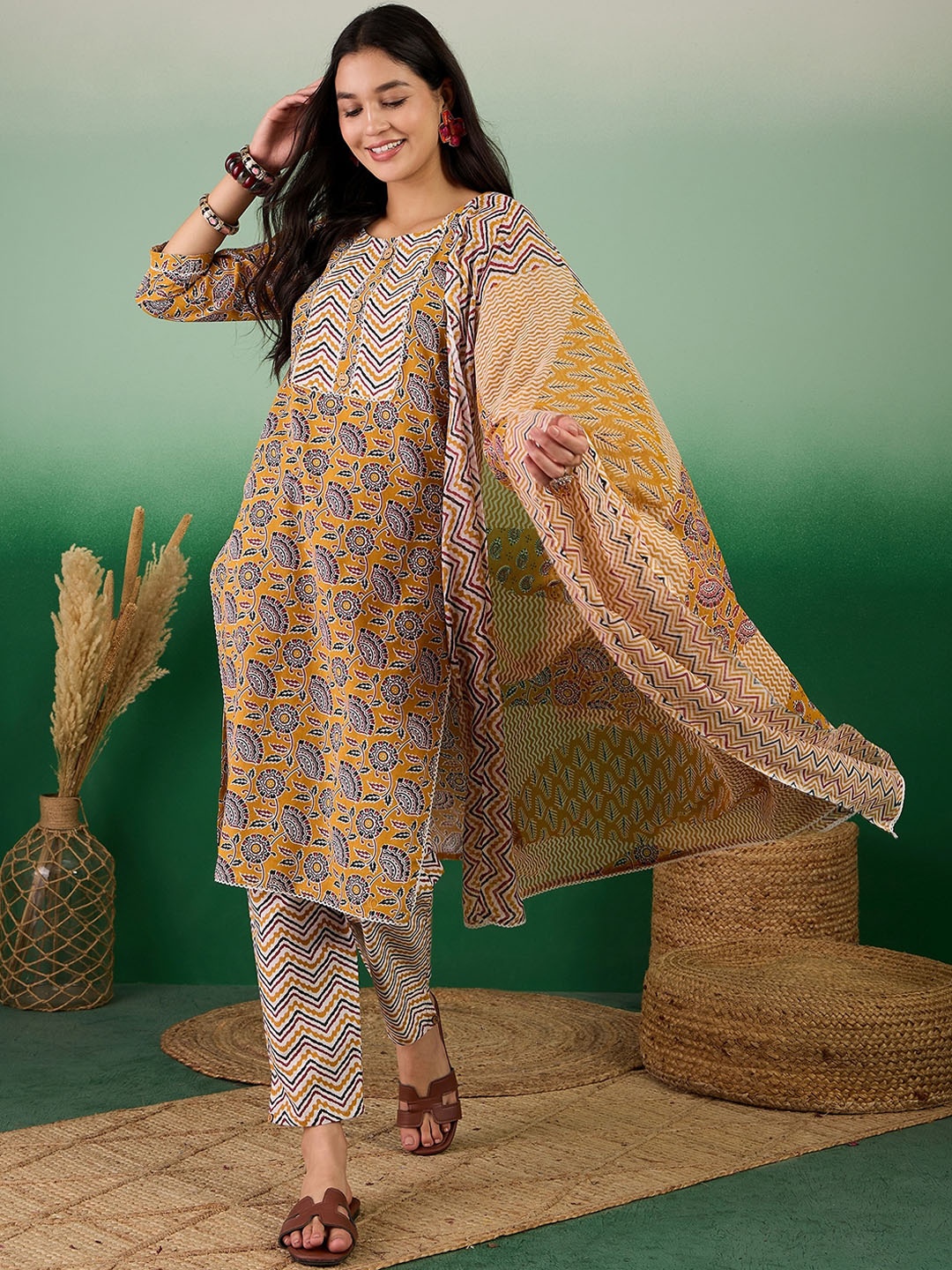 

Sangria Ethnic Motifs Printed Pure Cotton Straight Kurta With Trousers & Dupatta, Mustard