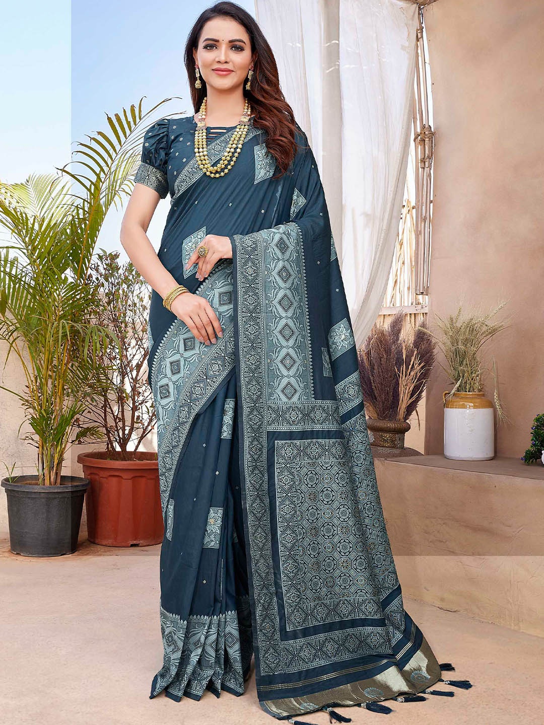 

Mitera Teal Green Ethnic Motifs Woven Design Zari Banarasi Saree