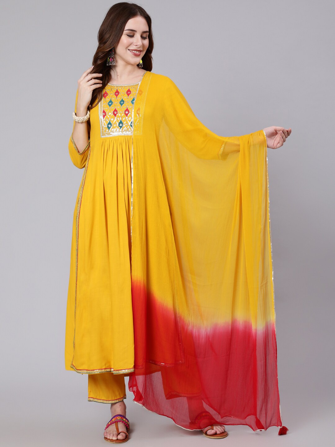 

GULMOHAR JAIPUR Geometric Flared Round Neck Embroidered Pure Cotton Anarkali Kurta Set, Mustard