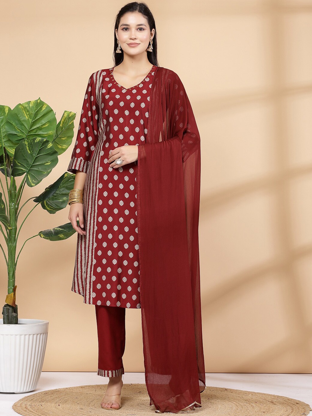 

Nayam By Lakshita Women Paisley Printed Regular Sequinned Chanderi Cotton Kurta with Palazzos & With Dupatta, Maroon