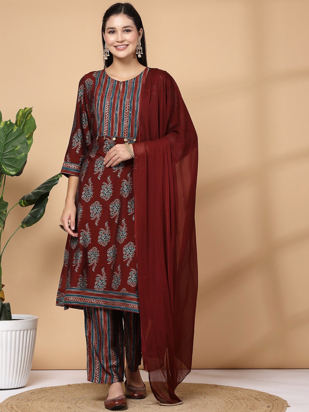 

Nayam By Lakshita Women Floral Printed Regular Sequinned Chanderi Cotton Kurta with Palazzos & With Dupatta, Maroon