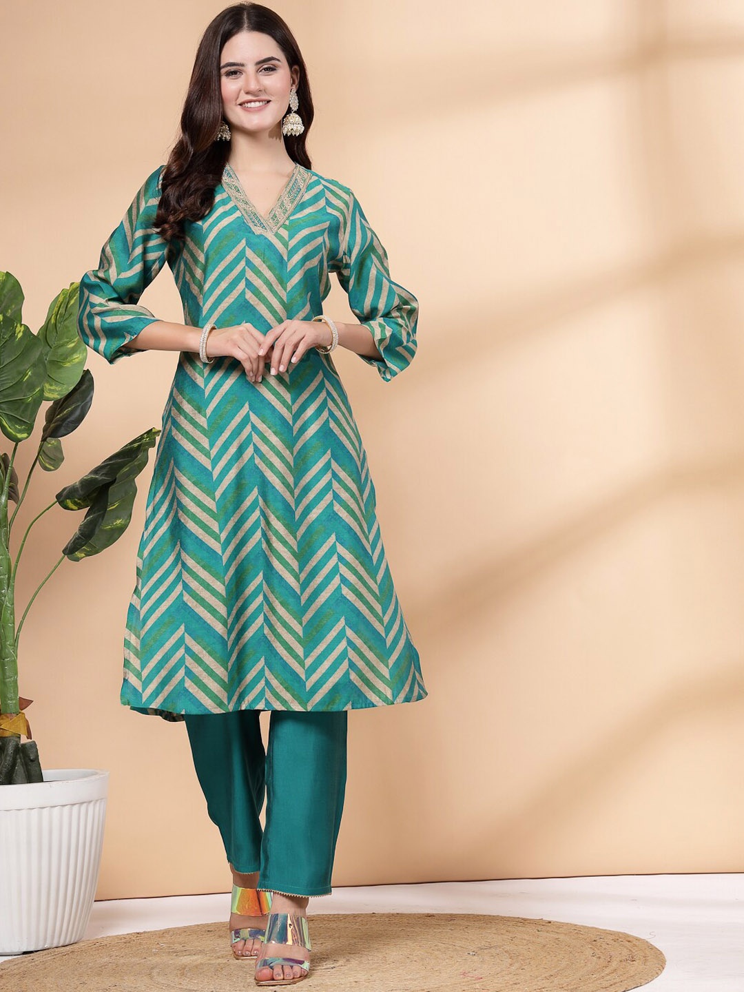 

Nayam By Lakshita Women Printed Regular Sequinned Kurta with Palazzos, Blue