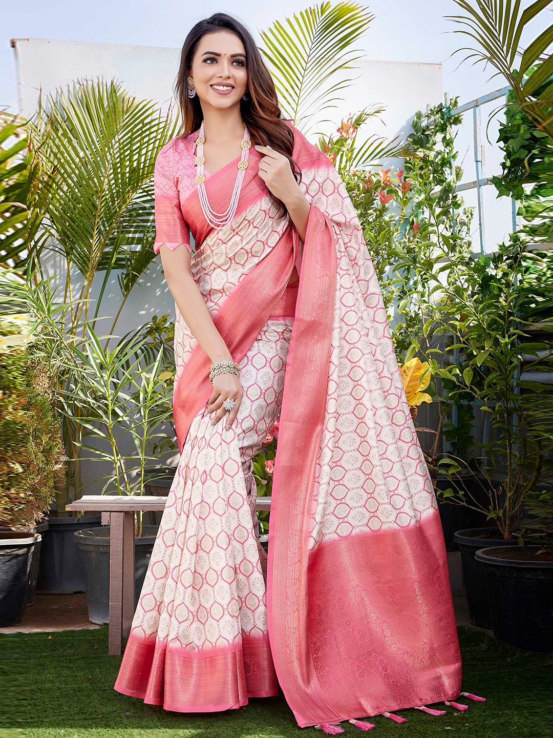 

Mitera Cream Coloured Ethnic Motifs Printed Zari Banarasi Saree