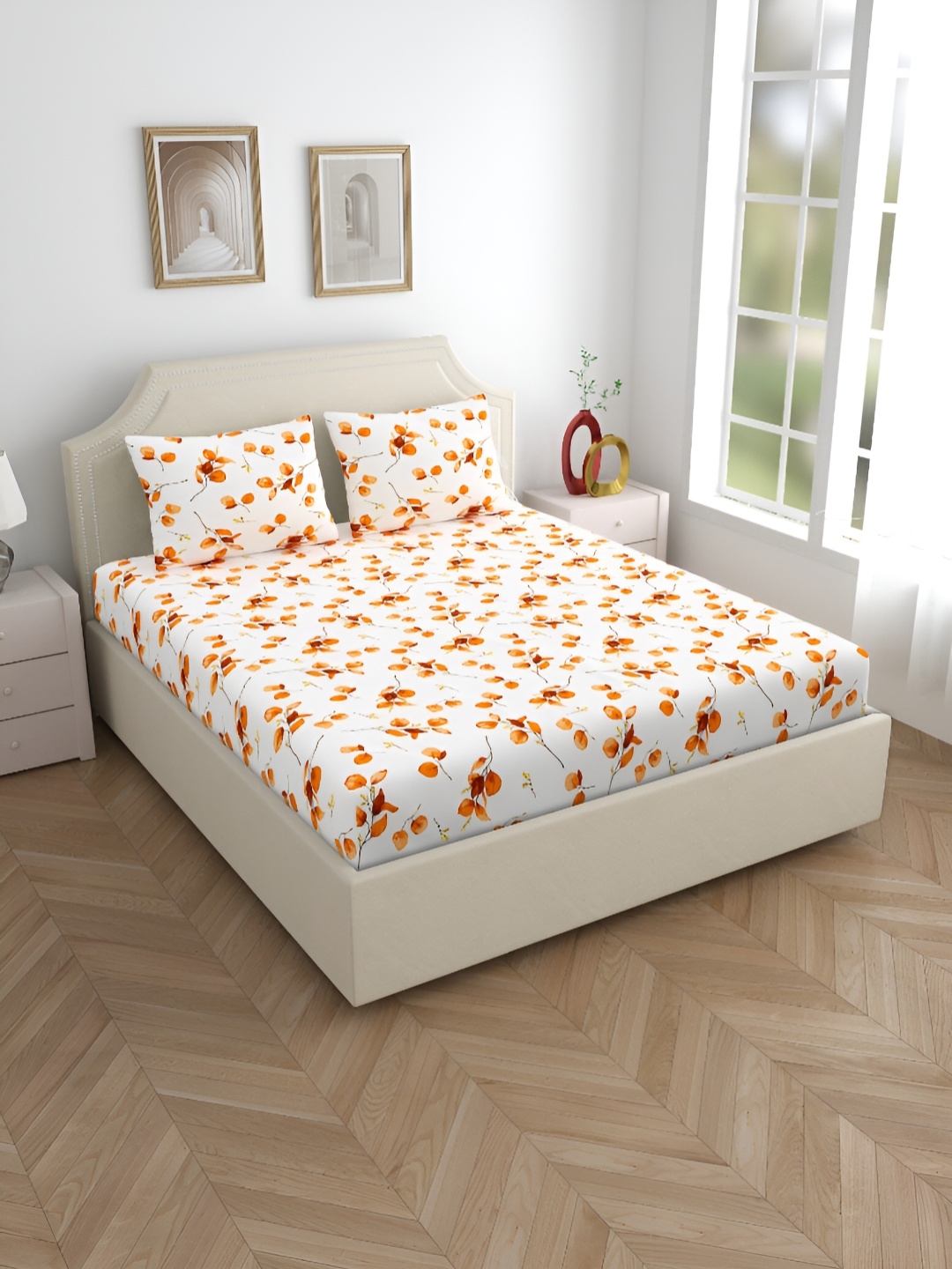 

Home Ecstasy White & Orange Floral 140 TC Cotton King Bedsheet with 2 Pillow Covers