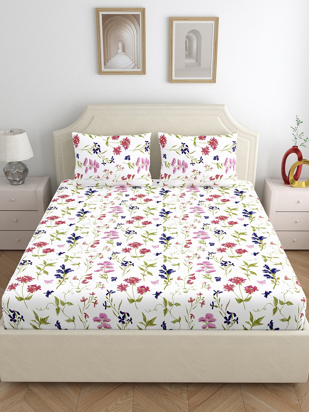 

Home Ecstasy White & Blue Floral 140 TC Cotton Queen Bedsheet with 2 Pillow Covers