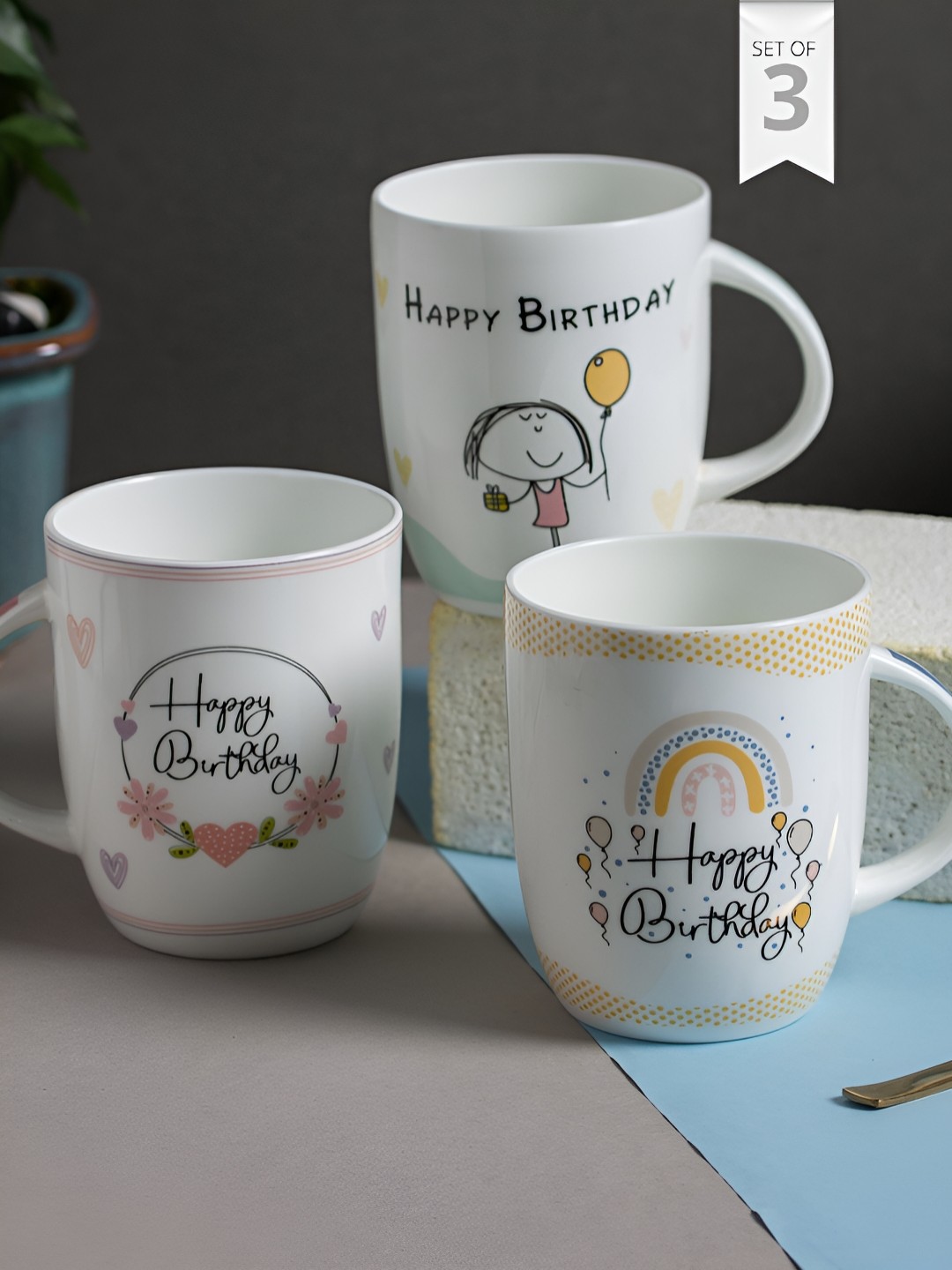 

JCPL Fine Ceramic White & Yellow 3 Pieces Printed Glossy Mugs 340 Ml