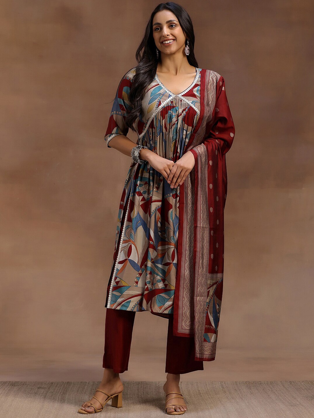 

Libas Women Printed Empire Sequinned Kurta with Trousers & With Dupatta, Maroon