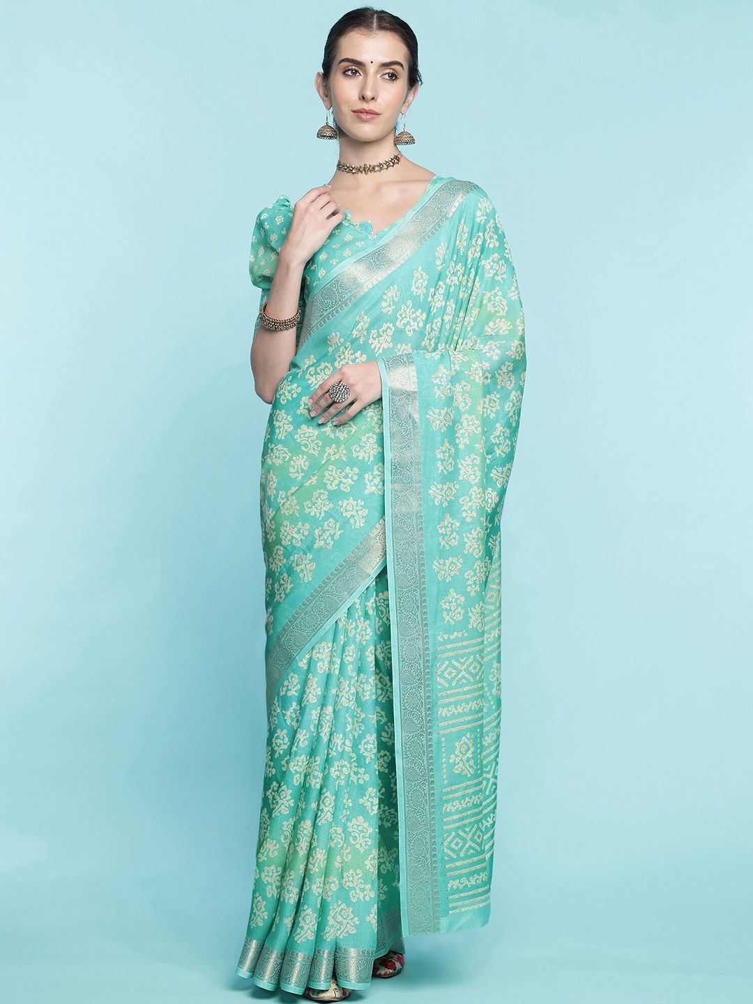 

Mitera Teal Blue Floral Printed Zari Art Silk Saree
