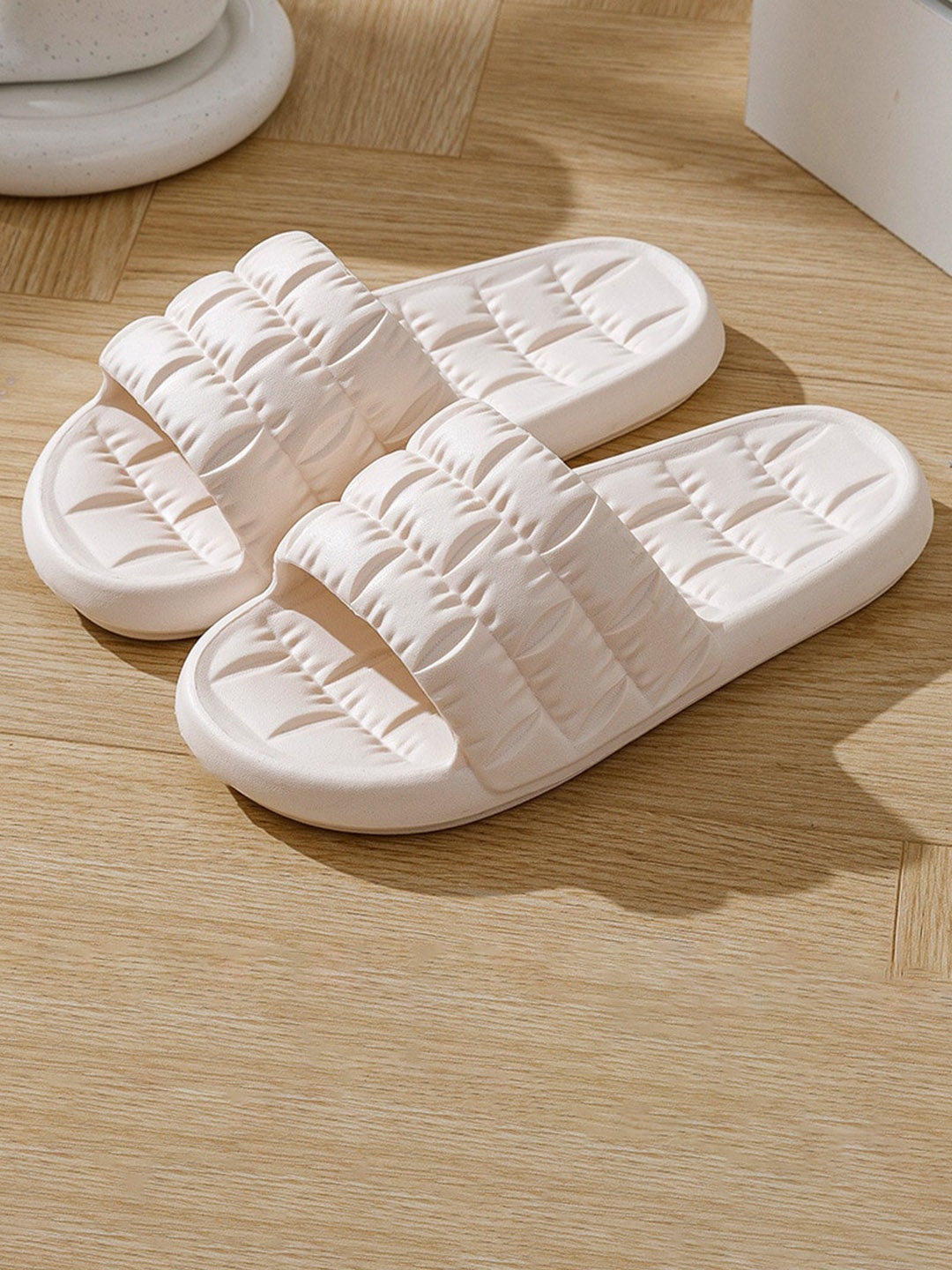 

Alexvyan Women Self Design Eva Slipper Light Weight Non-Skid Croslite Sliders, White