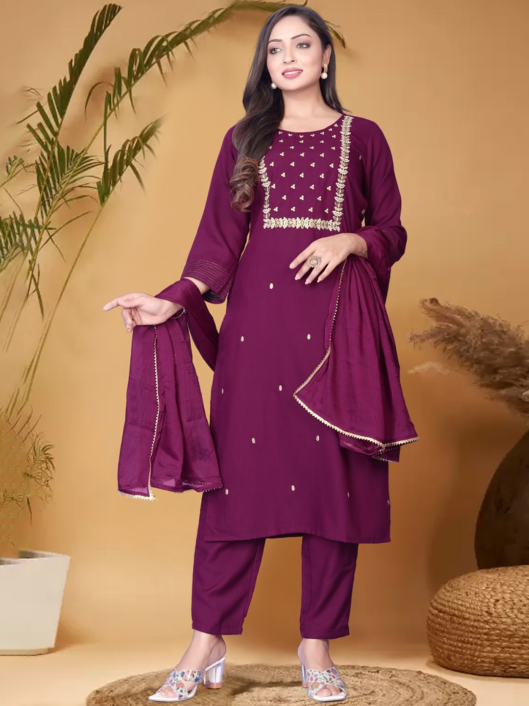 

Anouk Burgundy Ethnic Motifs Embroidered Round Neck Calf Length Zardozi Straight Kurta Set