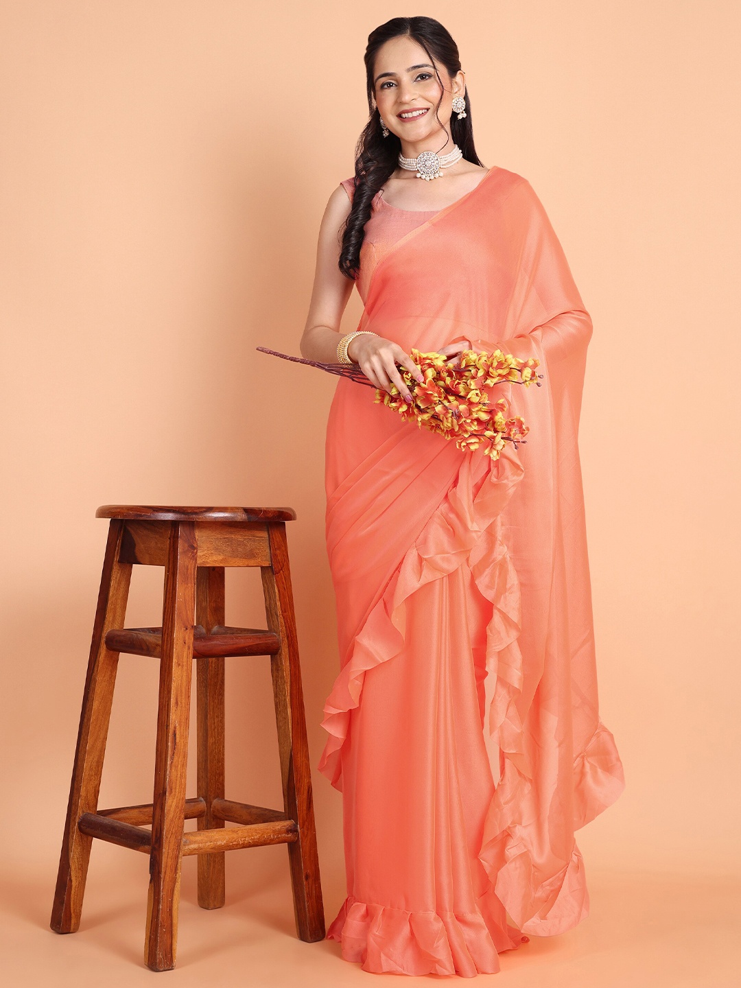 

Mitera Peach Coloured Ruffles Pure Georgette Saree