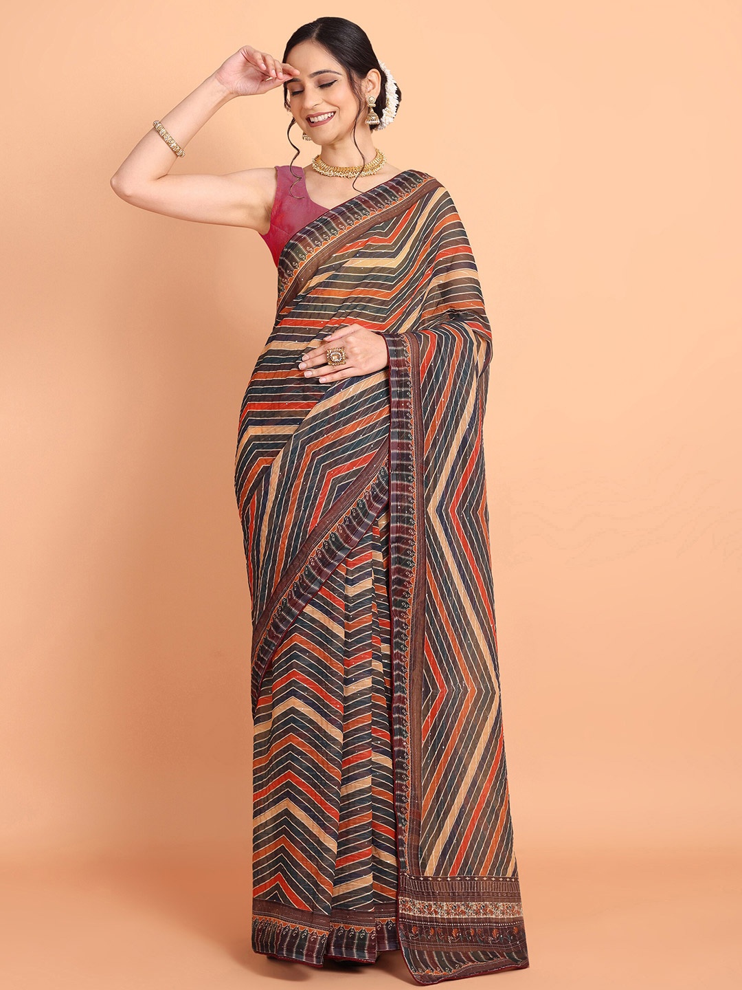 

Mitera Brown Striped Sequinned Saree