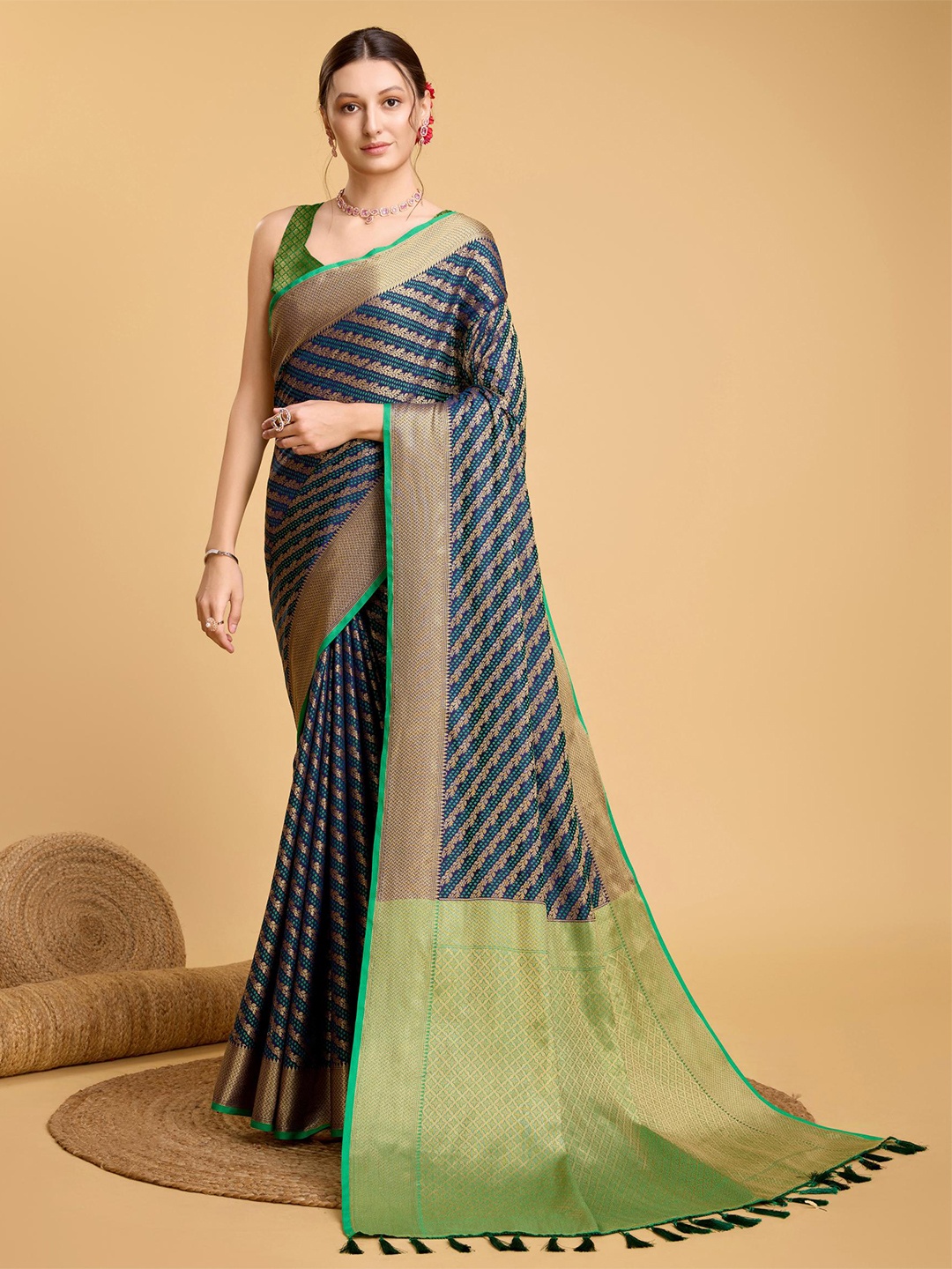 

Mitera Navy Blue Floral Woven Design Zari Patola Saree