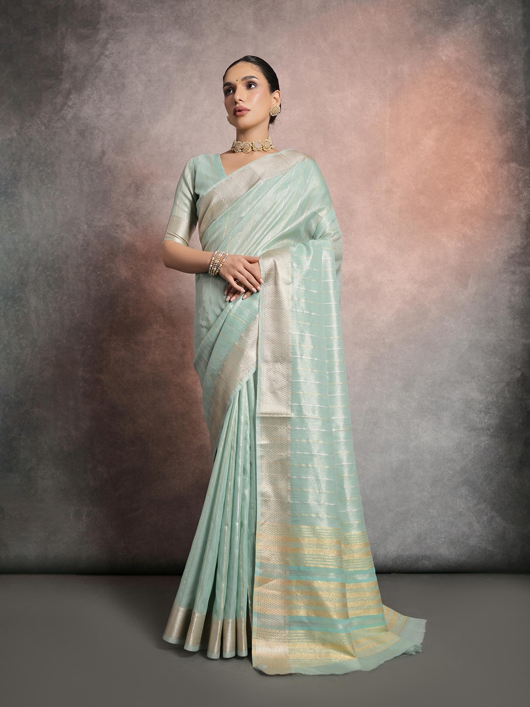 

Mitera Sea Green Striped Zari Banarasi Saree