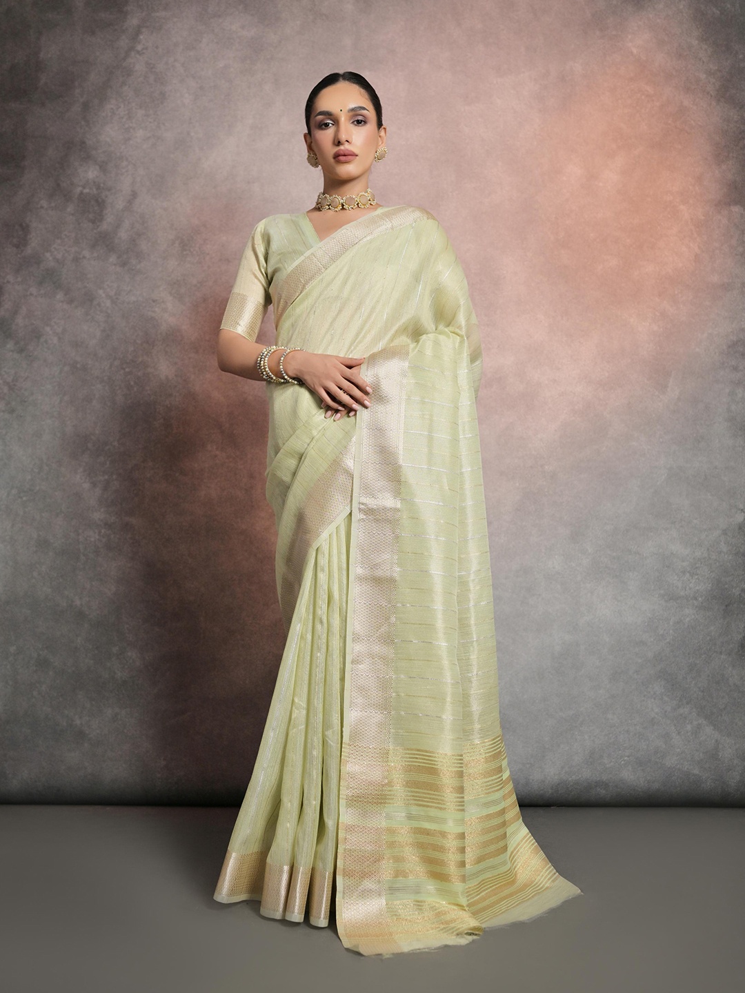 

Mitera Sea Green Striped Zari Banarasi Saree
