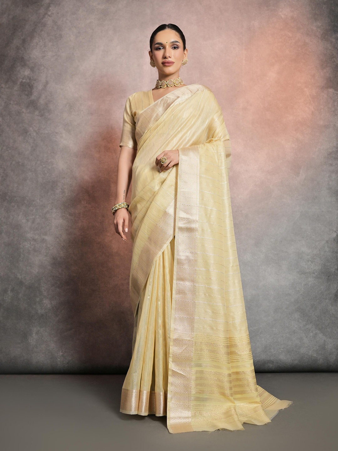 

Mitera Yellow Striped Zari Banarasi Saree