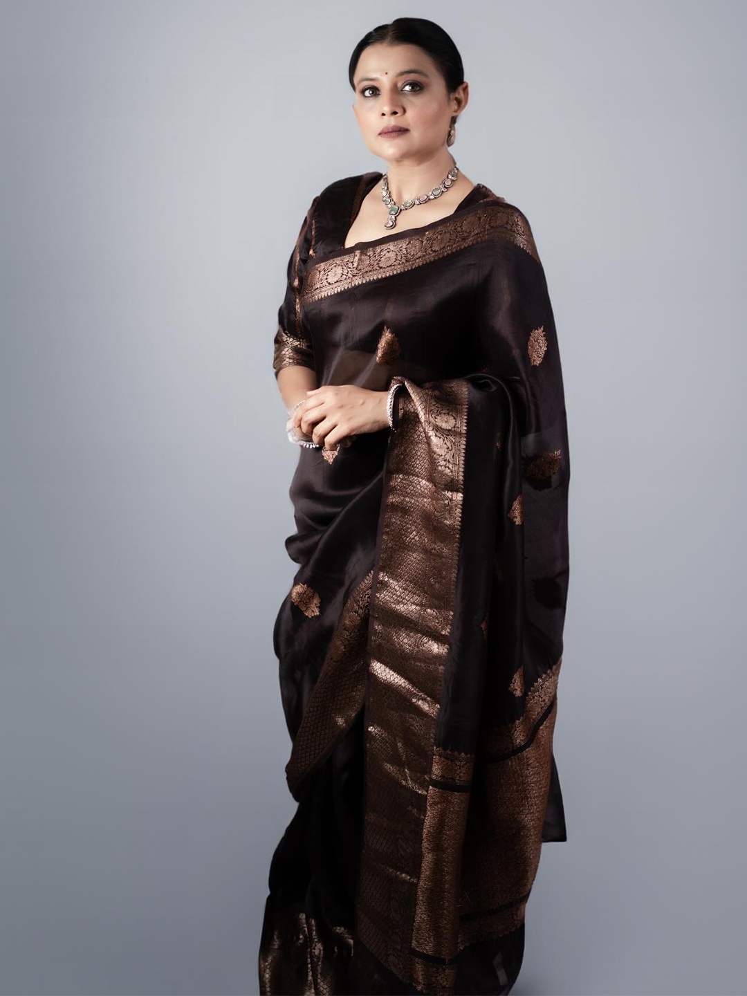

Mitera Brown Ethnic Motifs Woven Design Zari Saree
