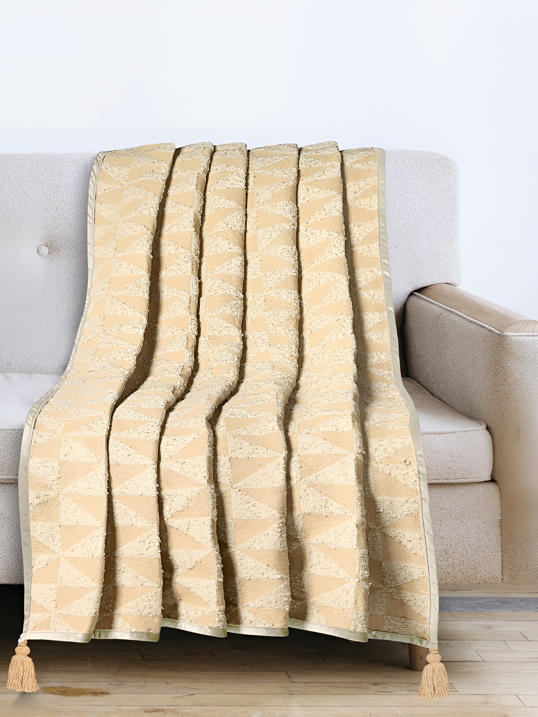 

Saral Home Soft Meri Beige Self-Design Throws