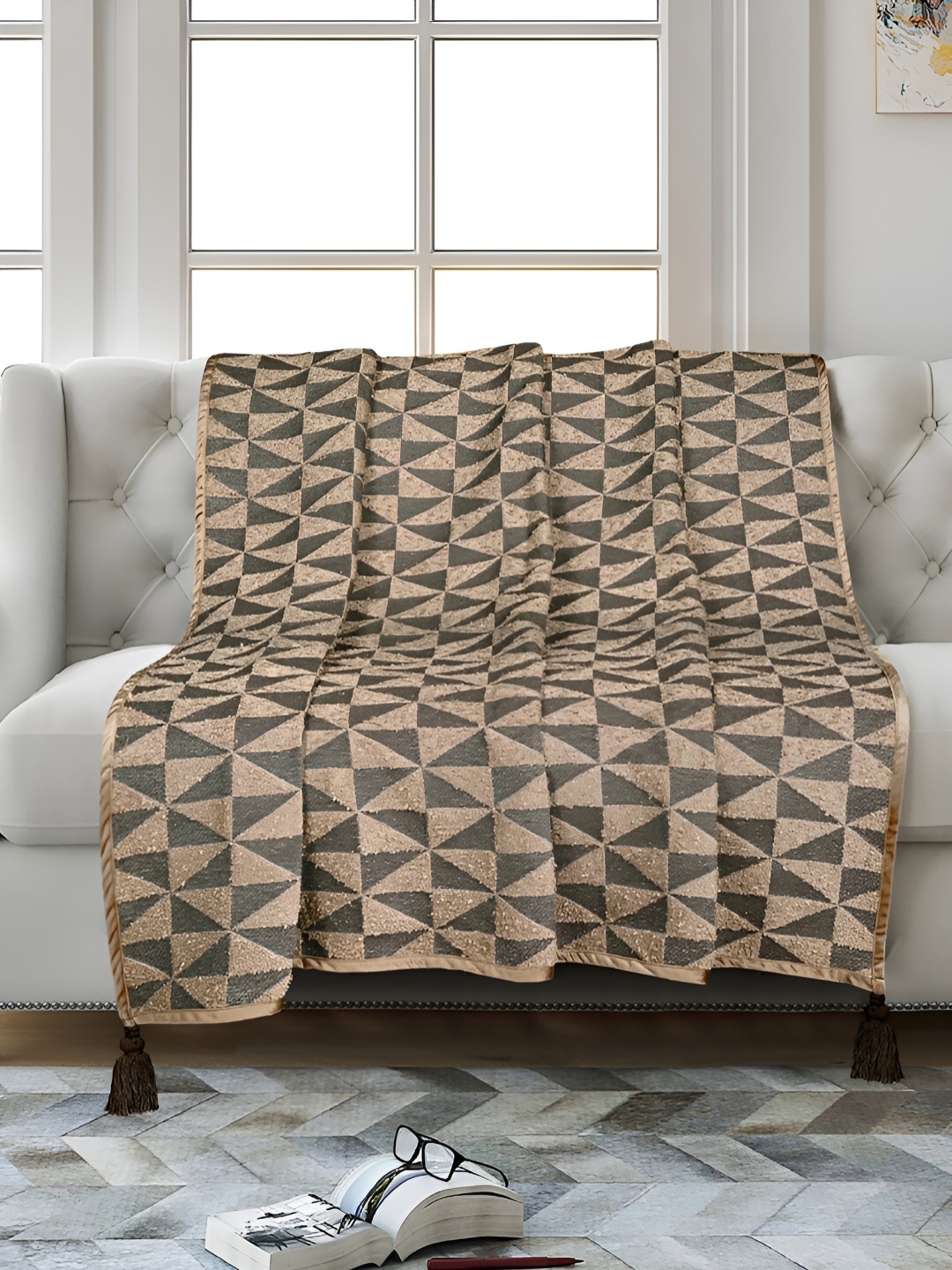 

Saral Home Brown & Black Self Design Sofa Throws