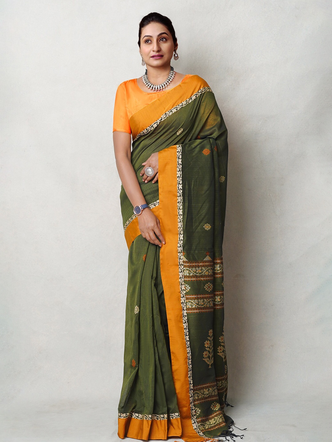 

Unnati Silks Woven Design Zari Pure Linen Handloom Jamdani Saree, Green